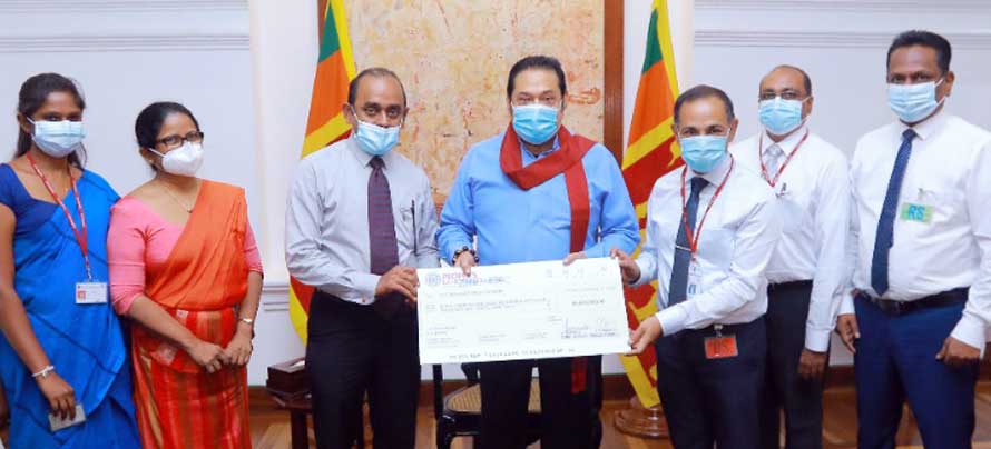 Peoples Bank joins hands with the ETF to award scholarships to children