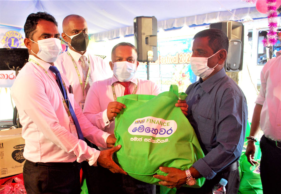 HNB FINANCE donates rations to 100 blind families through Mehewara initiative